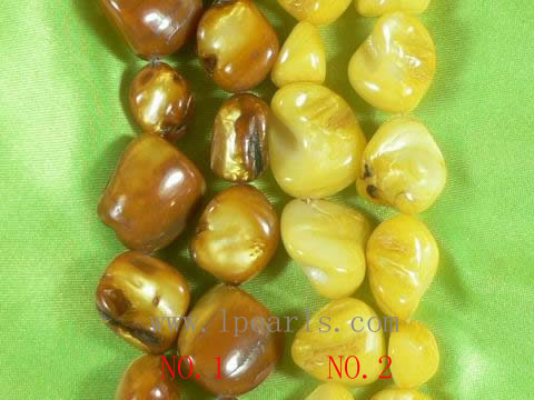 16" teeth yellow and coffee shell strand